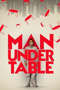    / Man Under Table